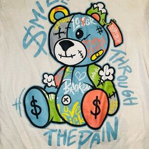 Size Small “Smile Through The Pain" graphic t-shirt by the brand DopeSkill